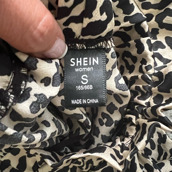 High waisted cheetah shirts. Silky material with tie belt. Never worn. - Picture 2 of 2